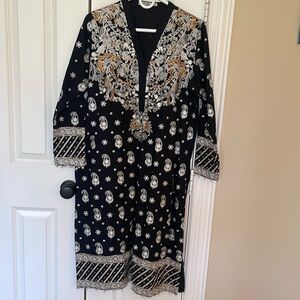 Indian Pakistani black kurta with white and gold embroidery from Khaadi.